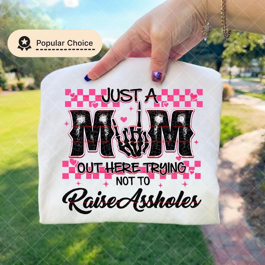 Just A Mom Out Here Trying Not To Raise Assholes Shirt Png file, Funny Mom Life Tee, Sarcastic Parenting Shirt, Trendy Mom Graphic Tee