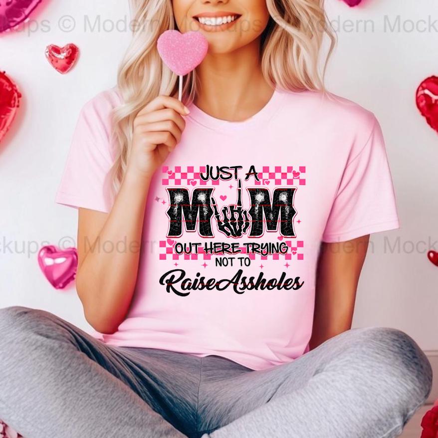 Just A Mom Out Here Trying Not To Raise Assholes Shirt Png file, Funny Mom Life Tee, Sarcastic Parenting Shirt, Trendy Mom Graphic Tee